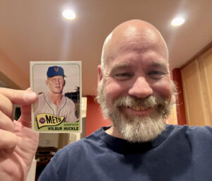 Jason holding a custom card of Wilbur Huckle